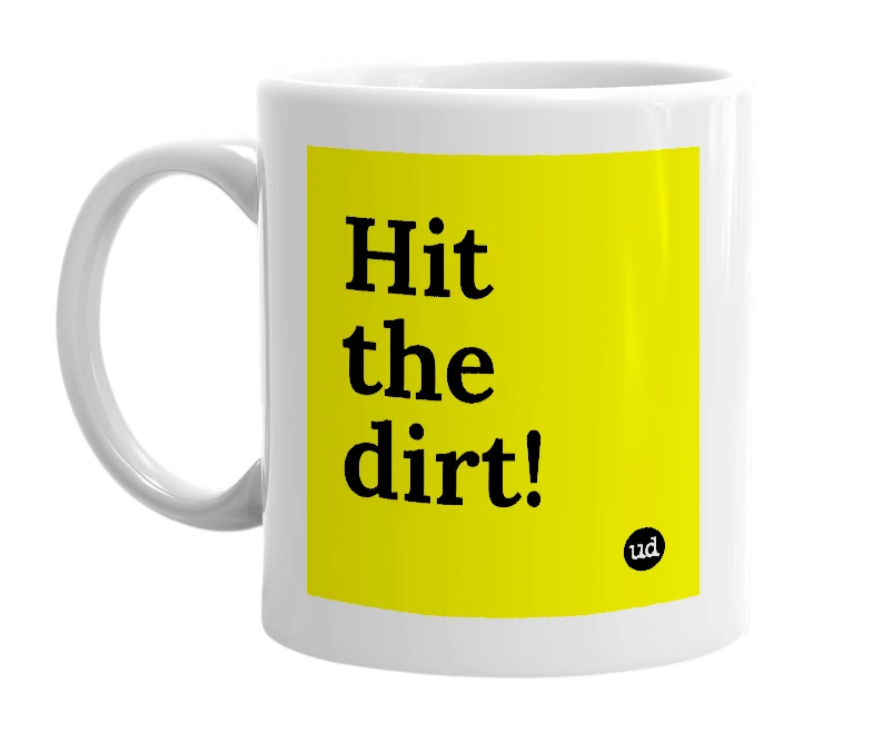 White mug with 'Hit the dirt!' in bold black letters