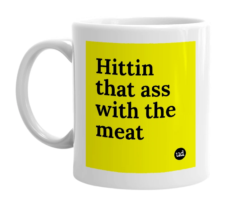 White mug with 'Hittin that ass with the meat' in bold black letters