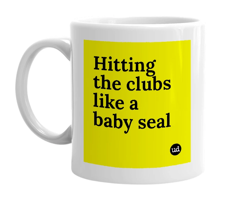 White mug with 'Hitting the clubs like a baby seal' in bold black letters