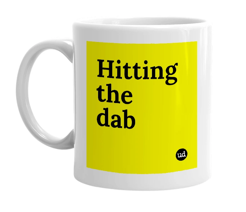 White mug with 'Hitting the dab' in bold black letters