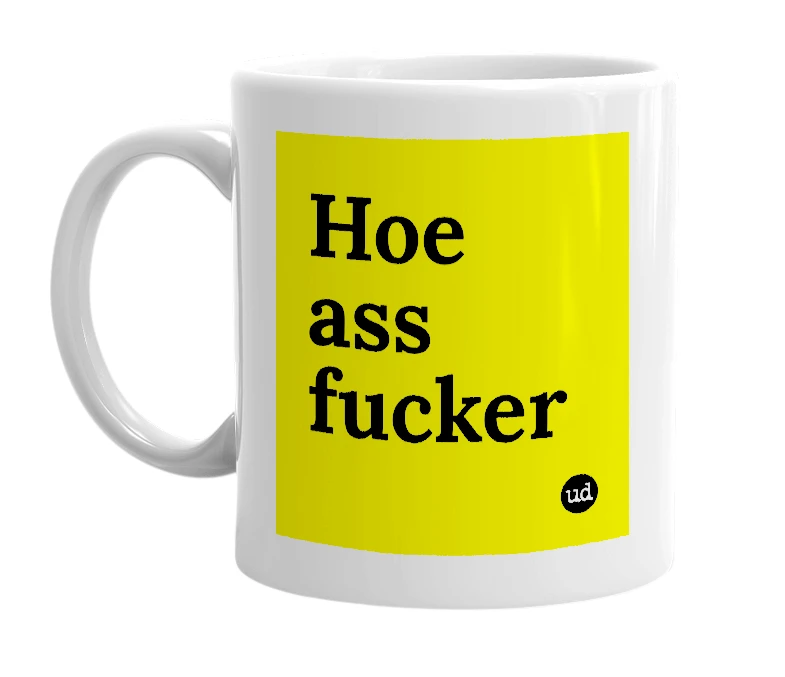 White mug with 'Hoe ass fucker' in bold black letters