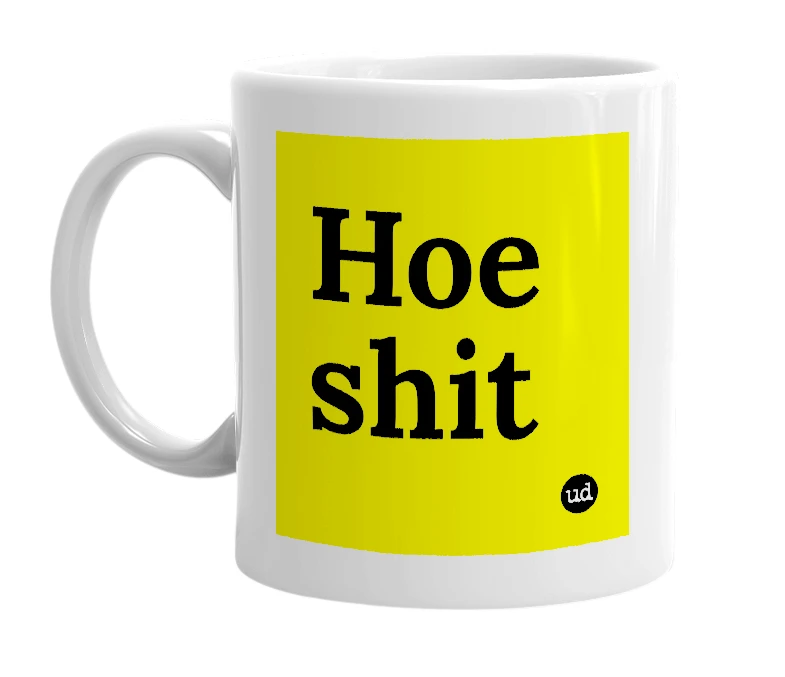 White mug with 'Hoe shit' in bold black letters