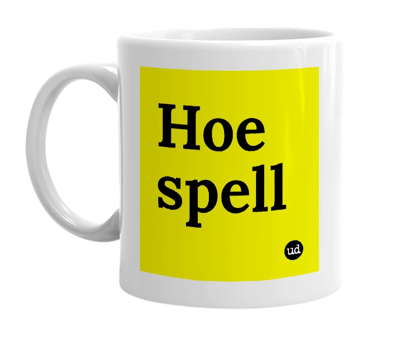 White mug with 'Hoe spell' in bold black letters