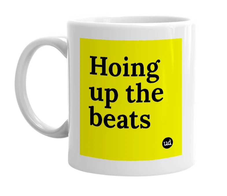 White mug with 'Hoing up the beats' in bold black letters