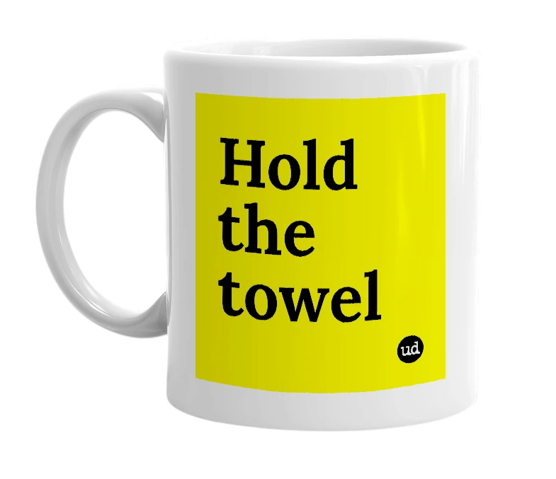 White mug with 'Hold the towel' in bold black letters