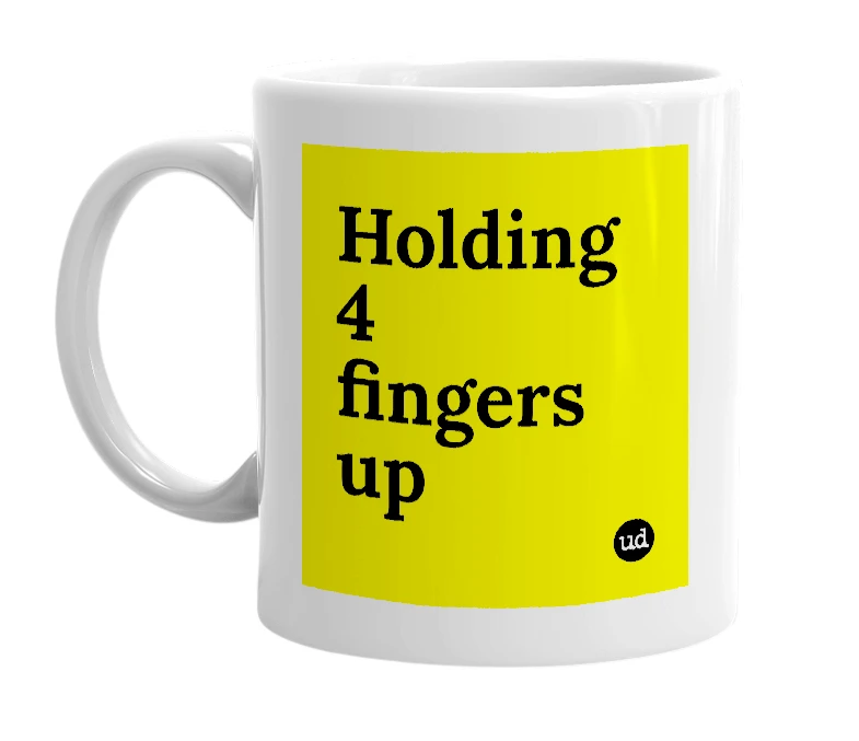 White mug with 'Holding 4 fingers up' in bold black letters