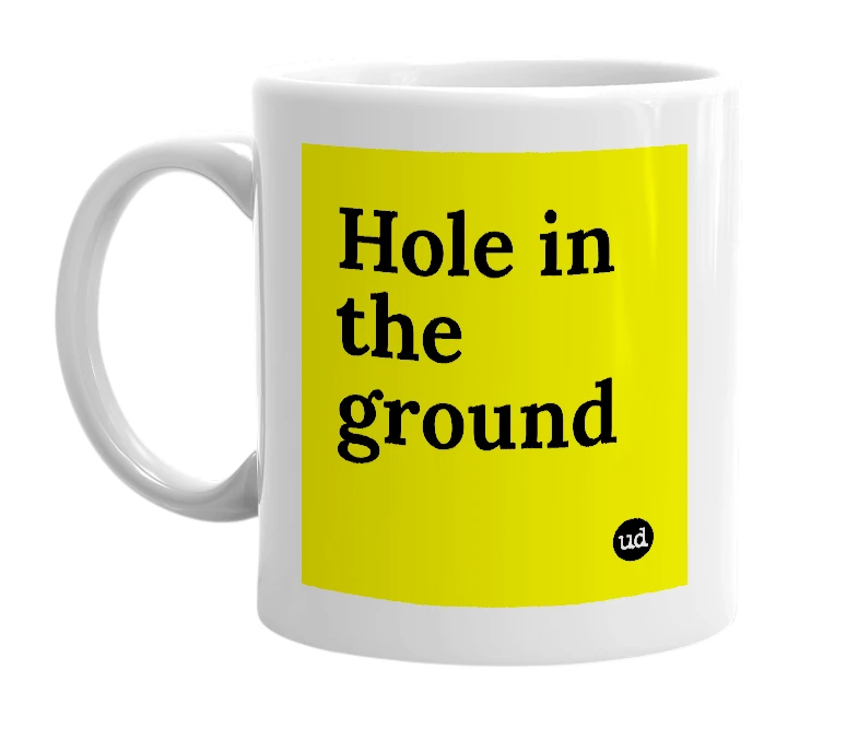 White mug with 'Hole in the ground' in bold black letters