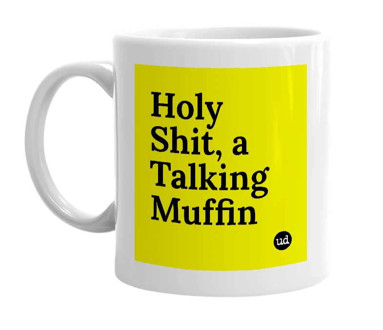 White mug with 'Holy Shit, a Talking Muffin' in bold black letters