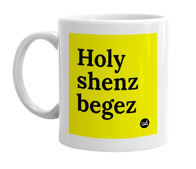 White mug with 'Holy shenz begez' in bold black letters