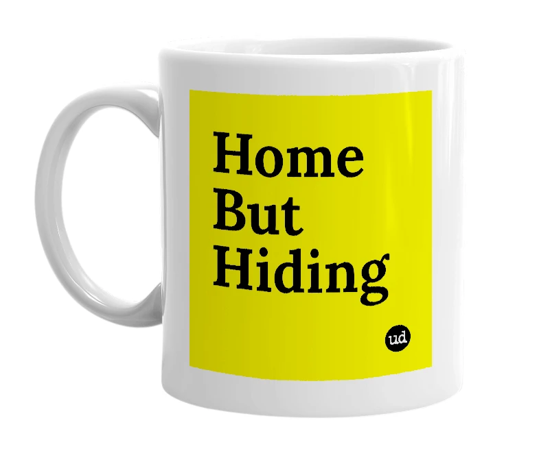 White mug with 'Home But Hiding' in bold black letters