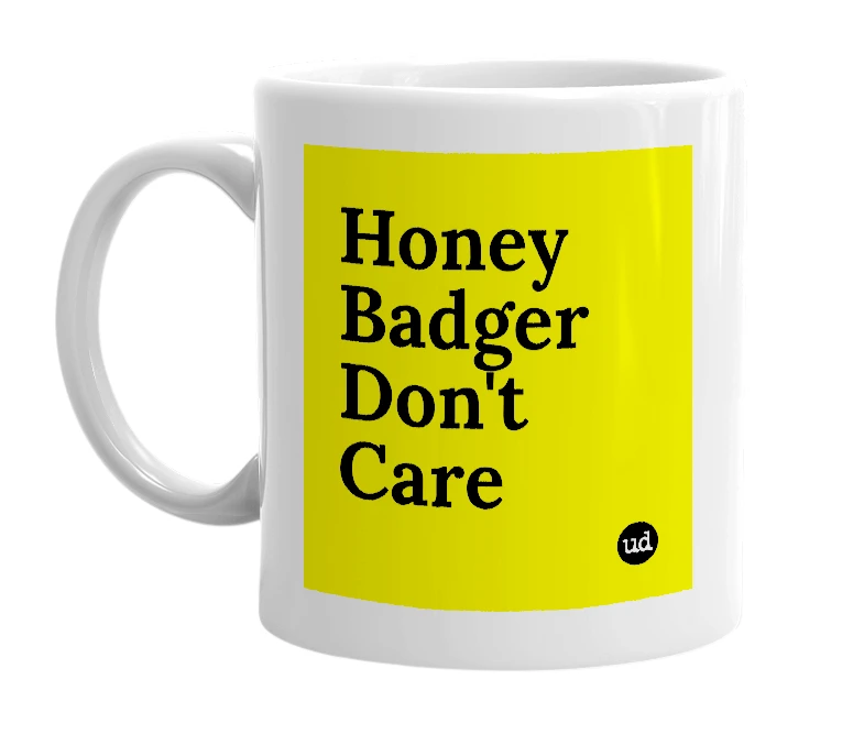 White mug with 'Honey Badger Don't Care' in bold black letters