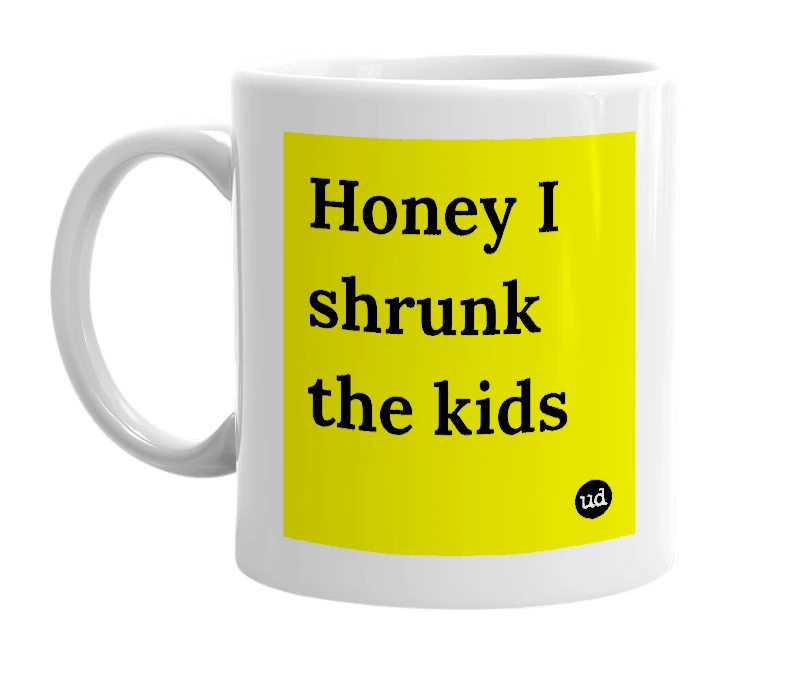 White mug with 'Honey I shrunk the kids' in bold black letters