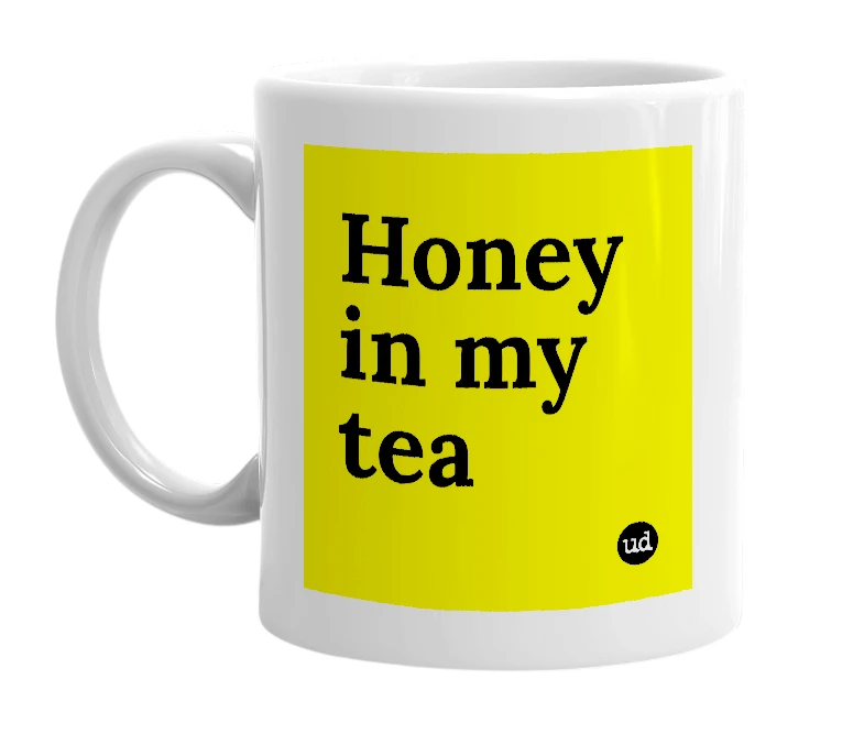 White mug with 'Honey in my tea' in bold black letters