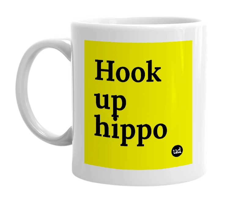 White mug with 'Hook up hippo' in bold black letters