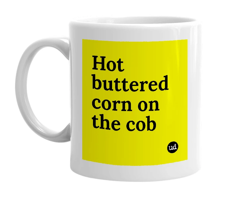 White mug with 'Hot buttered corn on the cob' in bold black letters