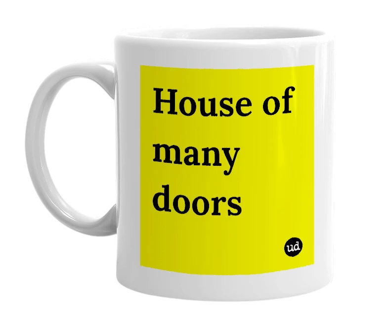 White mug with 'House of many doors' in bold black letters
