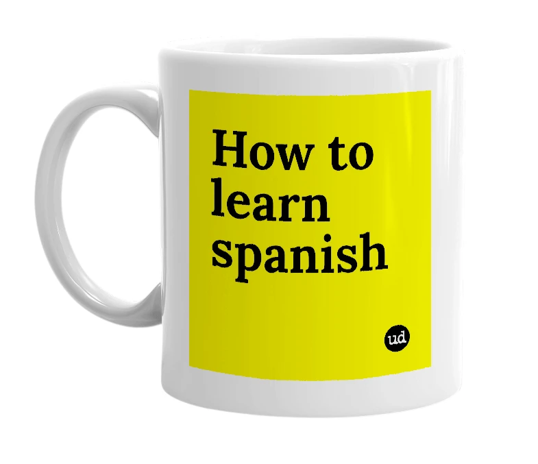 White mug with 'How to learn spanish' in bold black letters