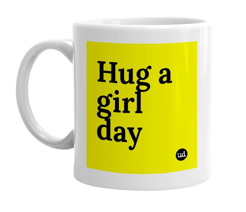 White mug with 'Hug a girl day' in bold black letters