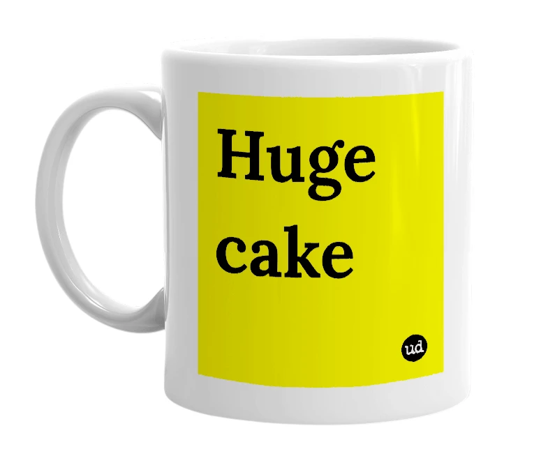 White mug with 'Huge cake' in bold black letters