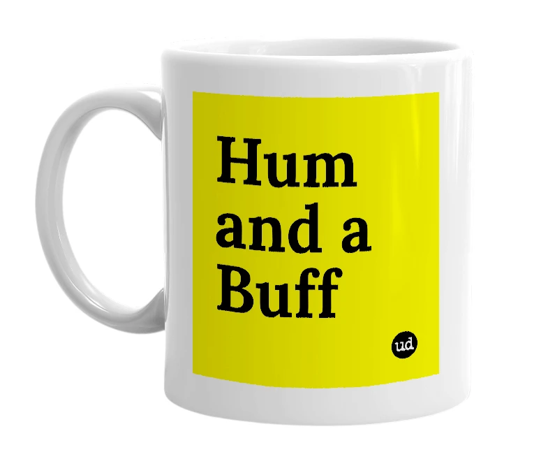 White mug with 'Hum and a Buff' in bold black letters