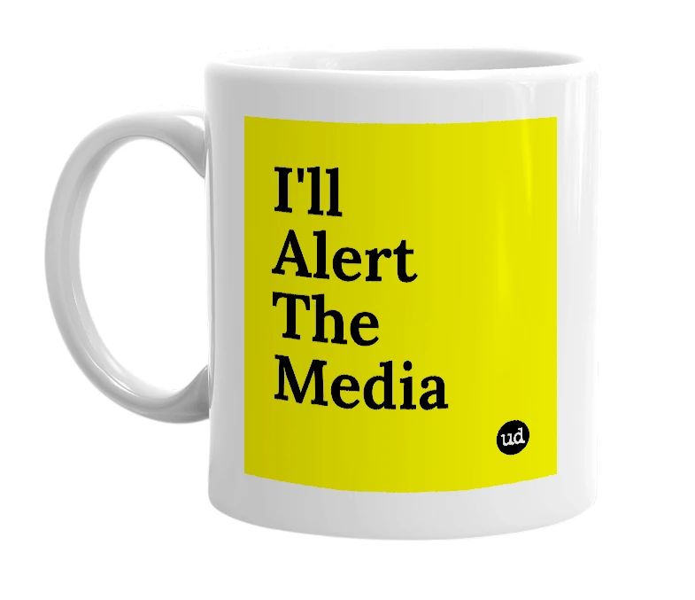 White mug with 'I'll Alert The Media' in bold black letters