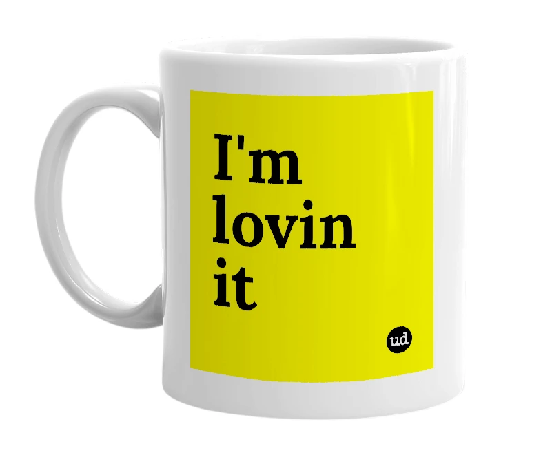 White mug with 'I'm lovin it' in bold black letters