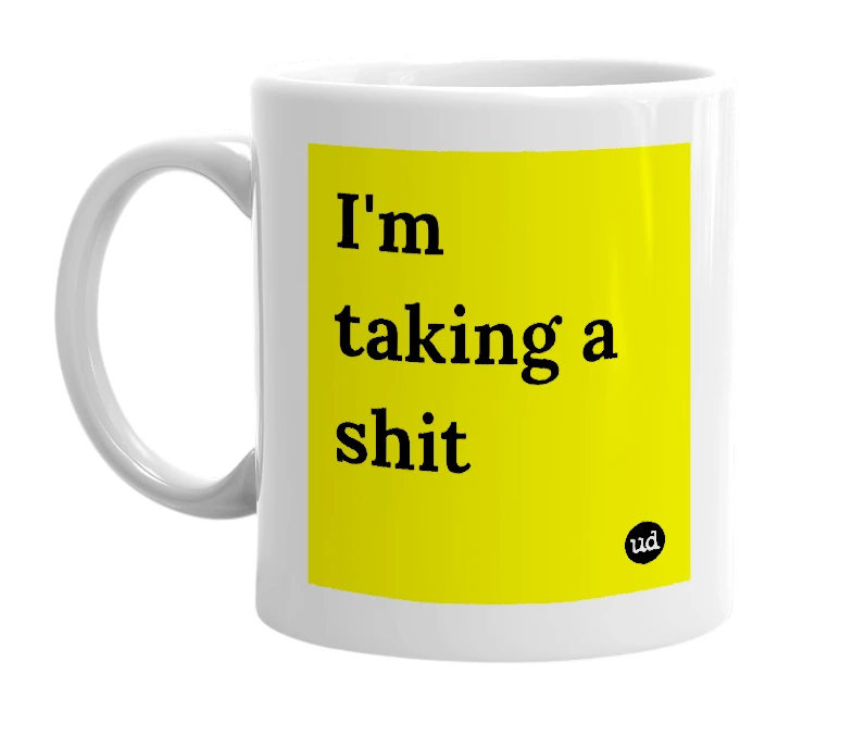 White mug with 'I'm taking a shit' in bold black letters