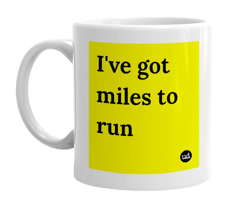 White mug with 'I've got miles to run' in bold black letters