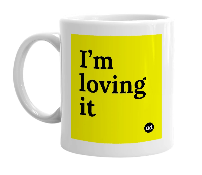 White mug with 'I’m loving it' in bold black letters