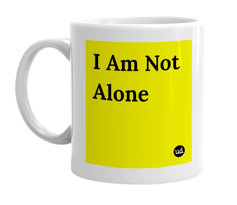 White mug with 'I Am Not Alone' in bold black letters