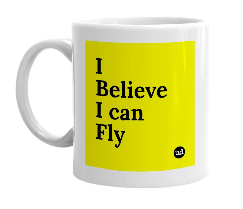 White mug with 'I Believe I can Fly' in bold black letters