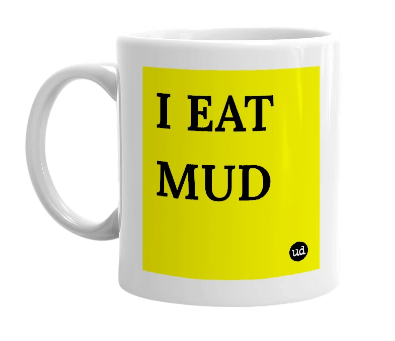 White mug with 'I EAT MUD' in bold black letters