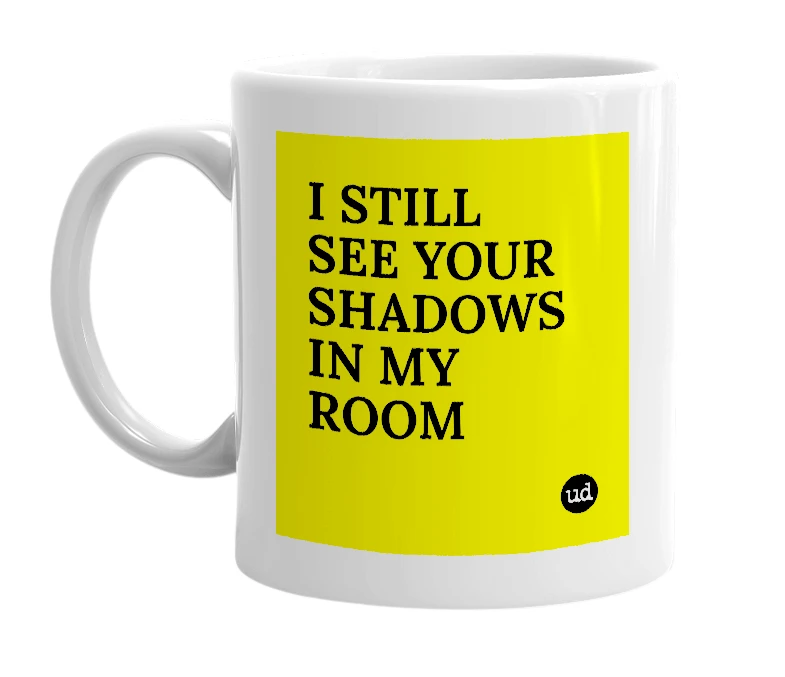 White mug with 'I STILL SEE YOUR SHADOWS IN MY ROOM' in bold black letters