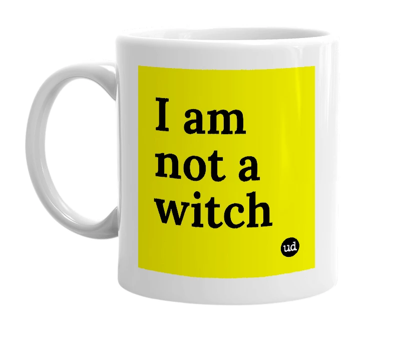 White mug with 'I am not a witch' in bold black letters