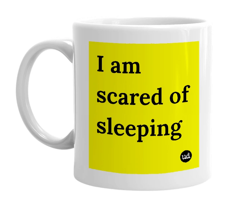 White mug with 'I am scared of sleeping' in bold black letters
