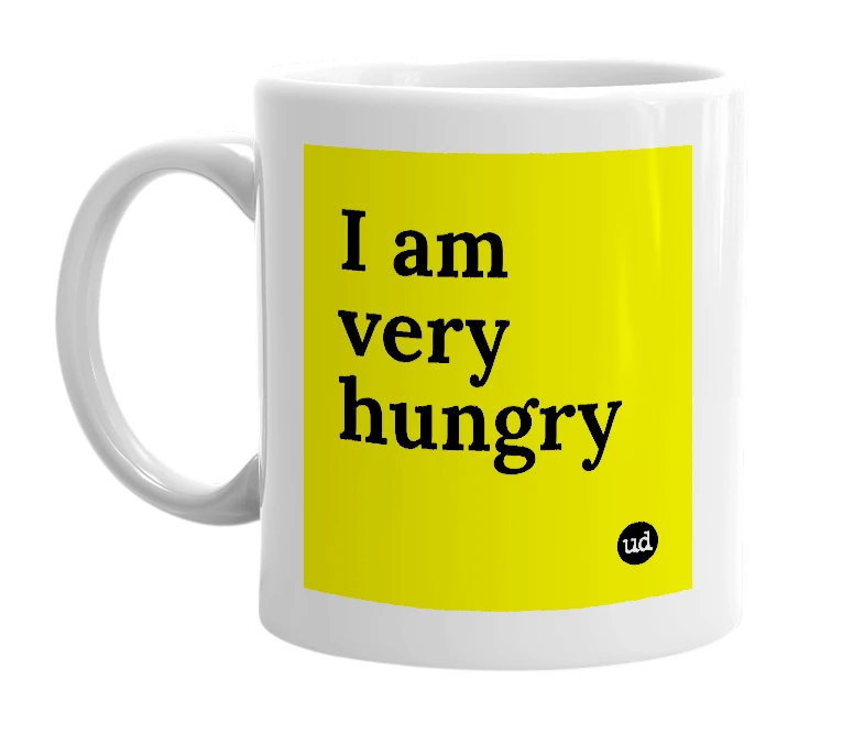 White mug with 'I am very hungry' in bold black letters