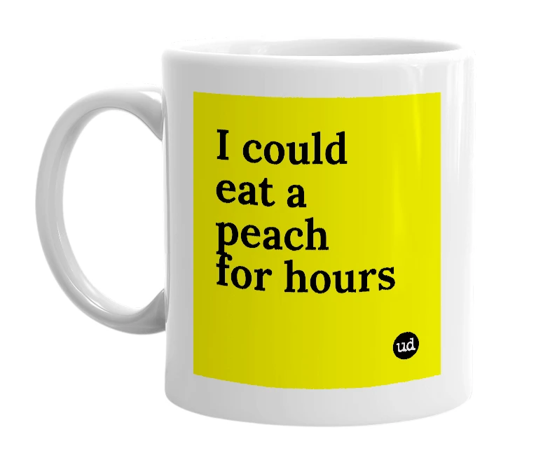 White mug with 'I could eat a peach for hours' in bold black letters