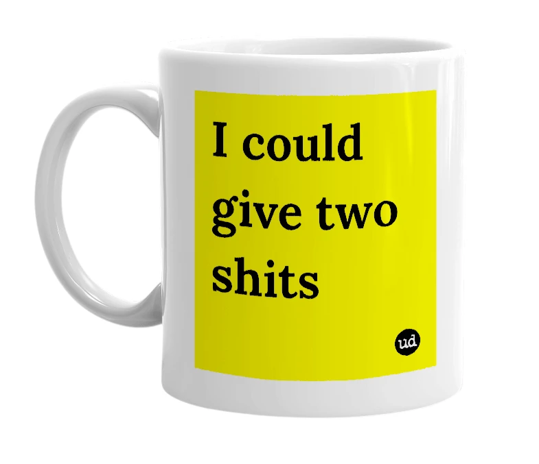 White mug with 'I could give two shits' in bold black letters
