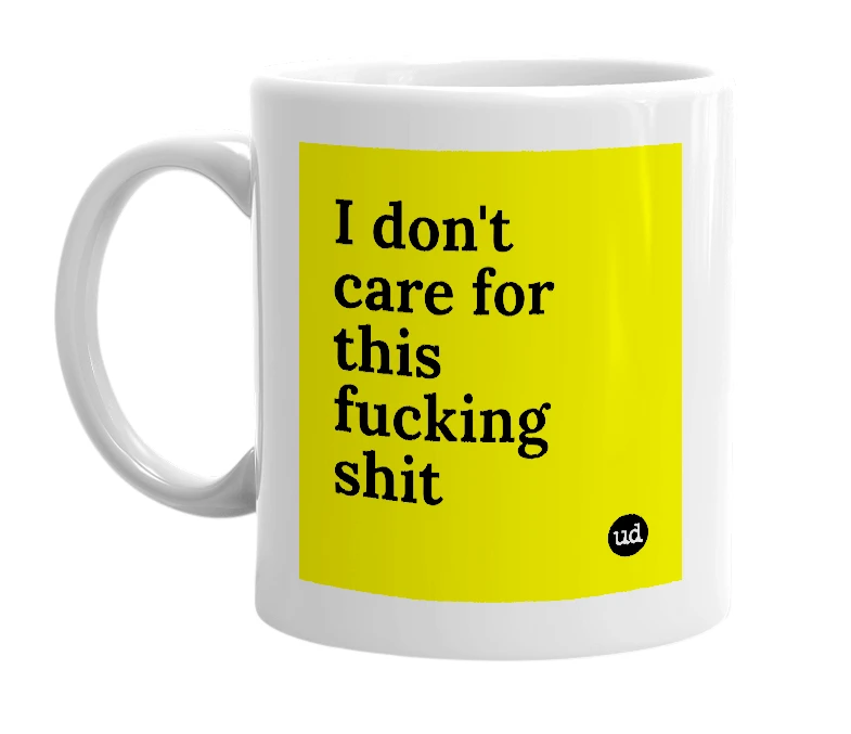 White mug with 'I don't care for this fucking shit' in bold black letters