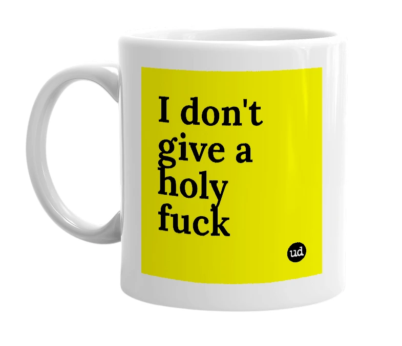 White mug with 'I don't give a holy fuck' in bold black letters