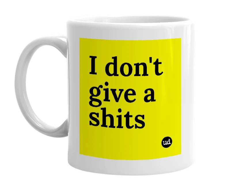 White mug with 'I don't give a shits' in bold black letters