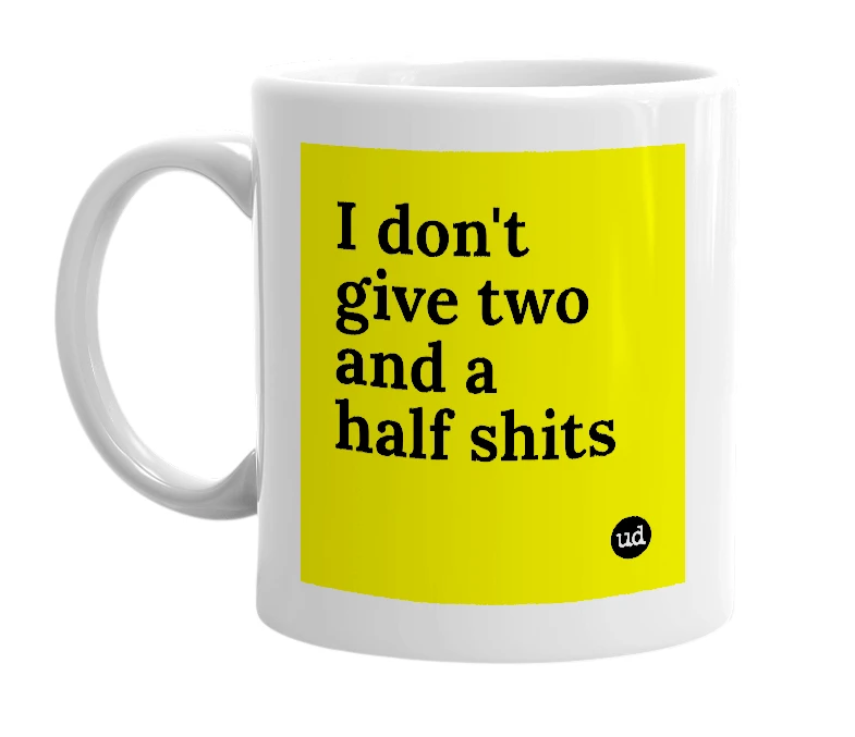 White mug with 'I don't give two and a half shits' in bold black letters