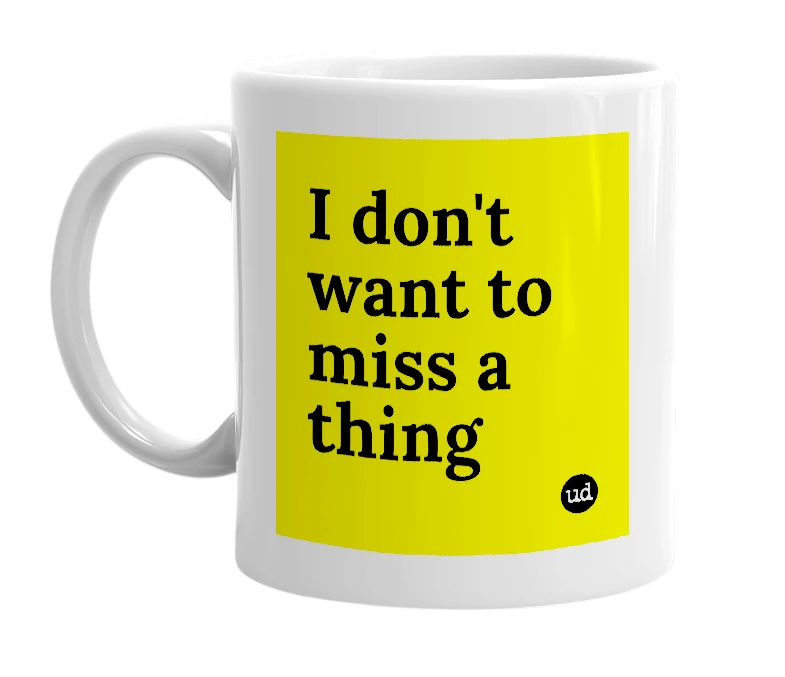 White mug with 'I don't want to miss a thing' in bold black letters