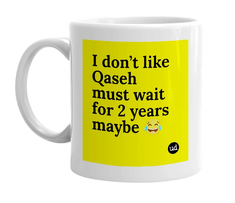 White mug with 'I don’t like Qaseh must wait for 2 years maybe 😂' in bold black letters