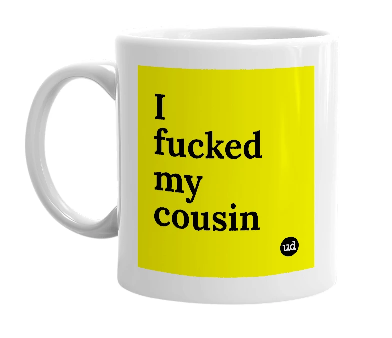 White mug with 'I fucked my cousin' in bold black letters