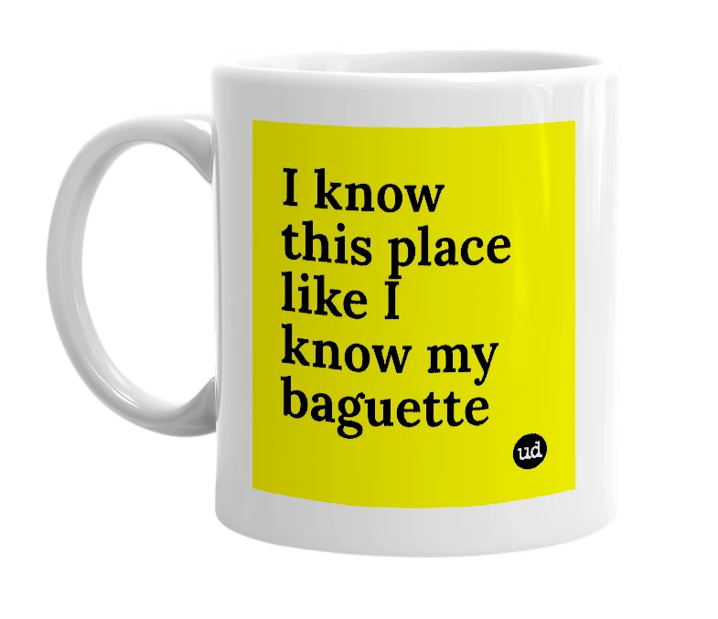 White mug with 'I know this place like I know my baguette' in bold black letters