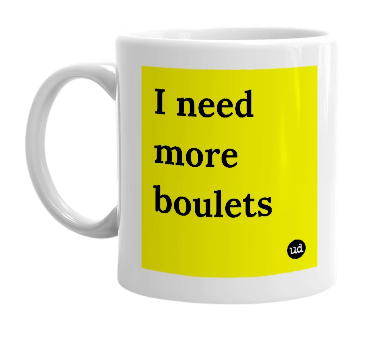 White mug with 'I need more boulets' in bold black letters