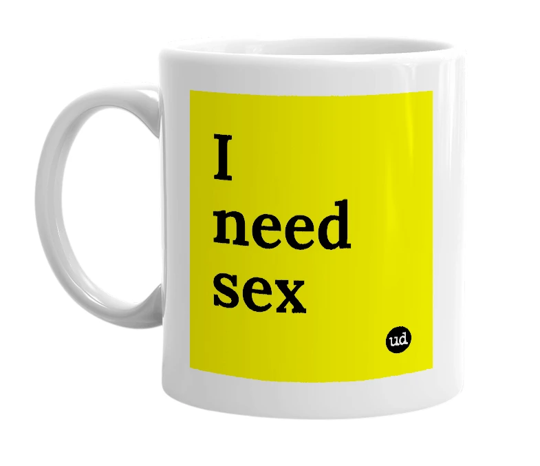 White mug with 'I need sex' in bold black letters