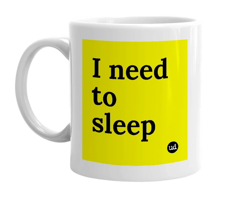 White mug with 'I need to sleep' in bold black letters