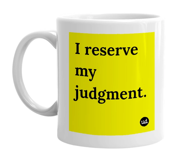 White mug with 'I reserve my judgment.' in bold black letters